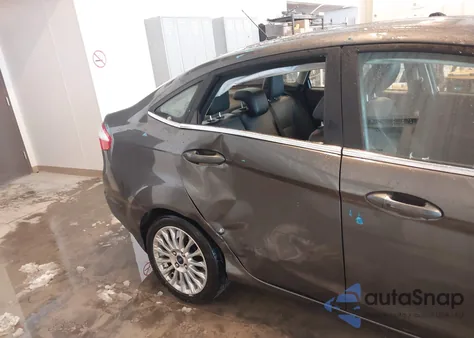 2015 Ford Fiesta Titanium from USA, damaged, VIN 3FADP4CJ2FM129362